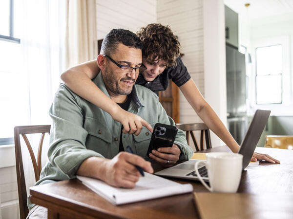 A couple looking at something on their phone