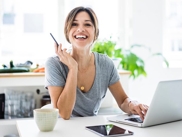 Woman smiling with laptop