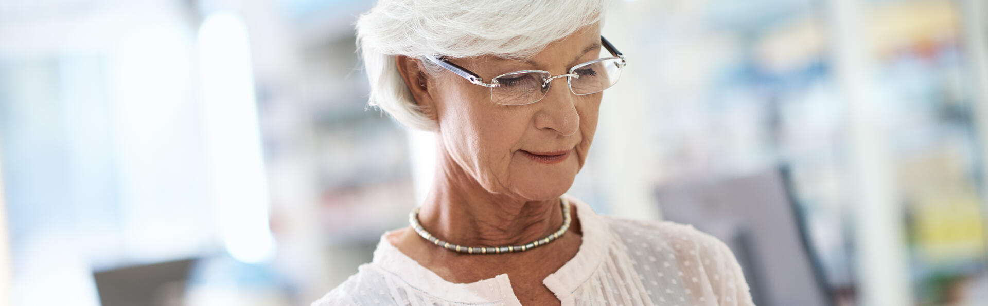 Elderly woman in white