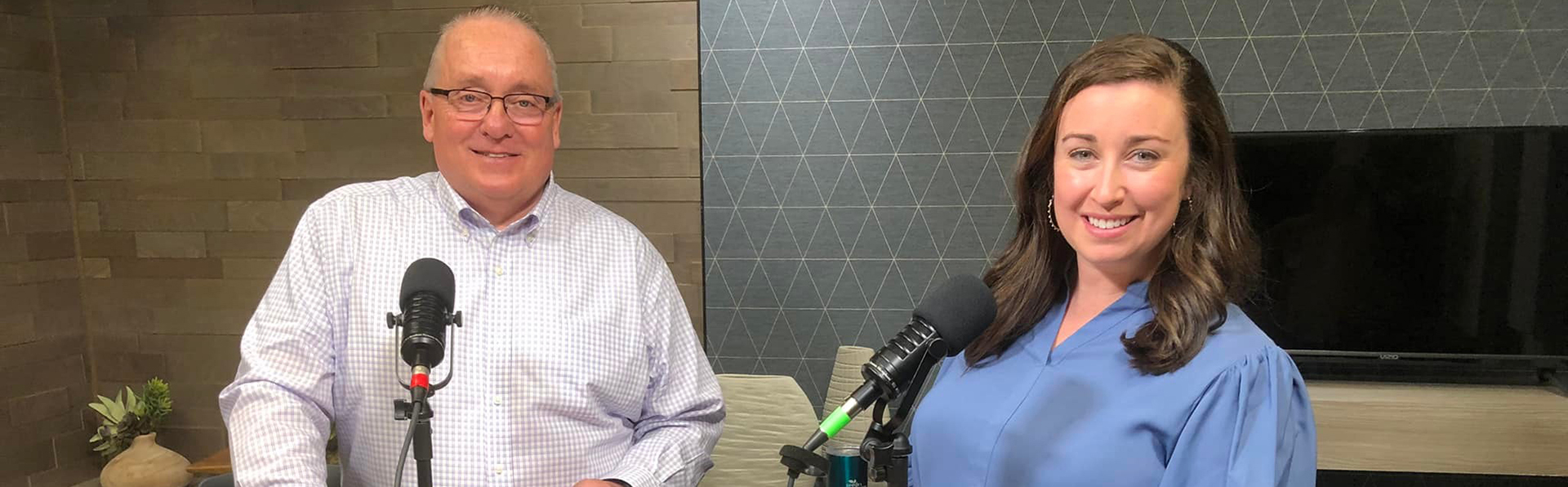 Jack Arnett and Courtney Collen with microphones